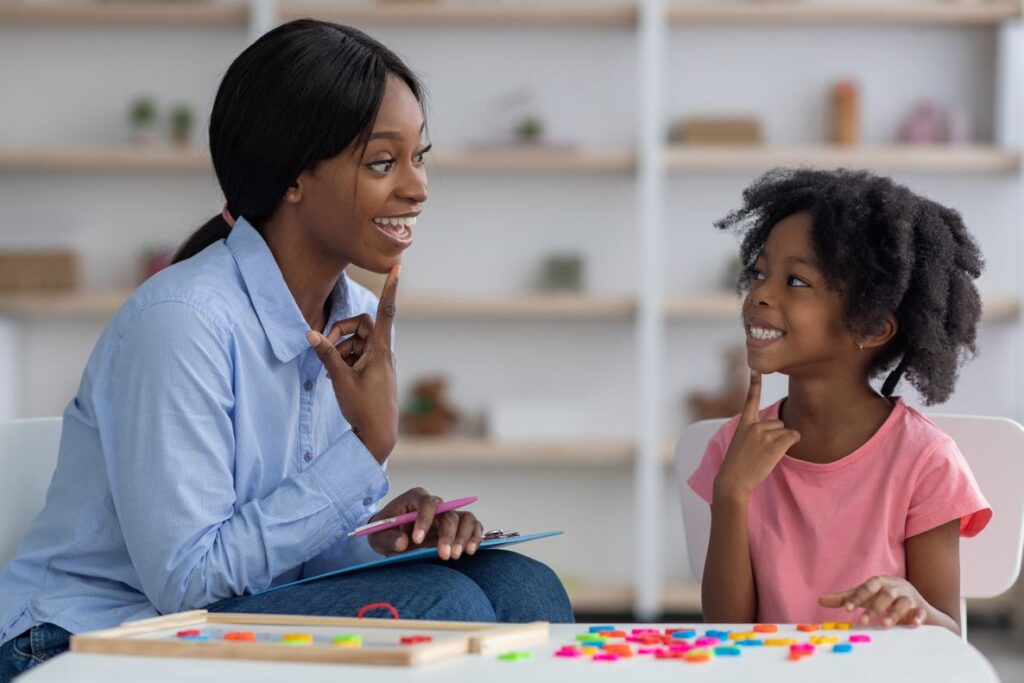 A little girl at speech therapy